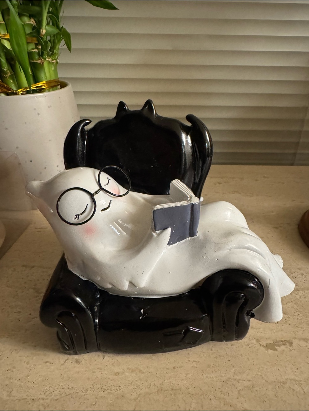 Hobby Lobby White Ghost Figurine on Black Chair